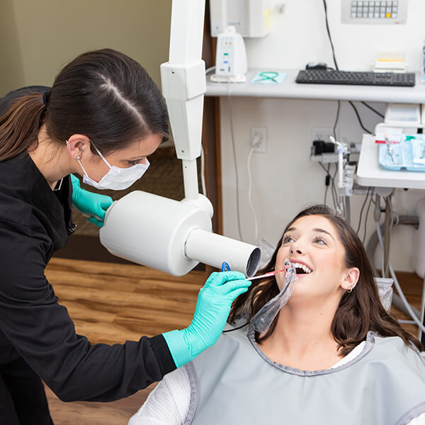 A female patient in the dental chair
